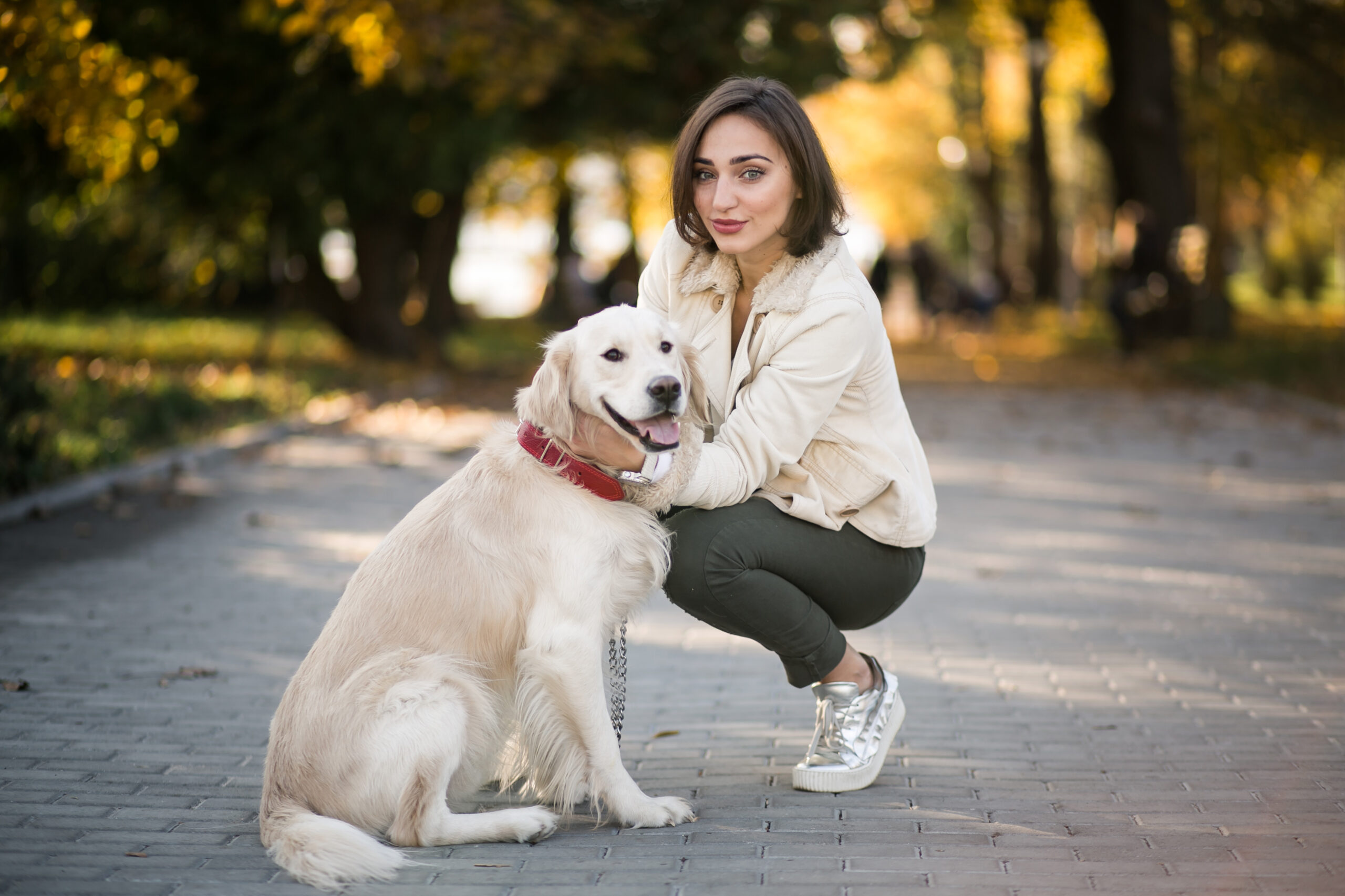 A woman with her dog outdoors